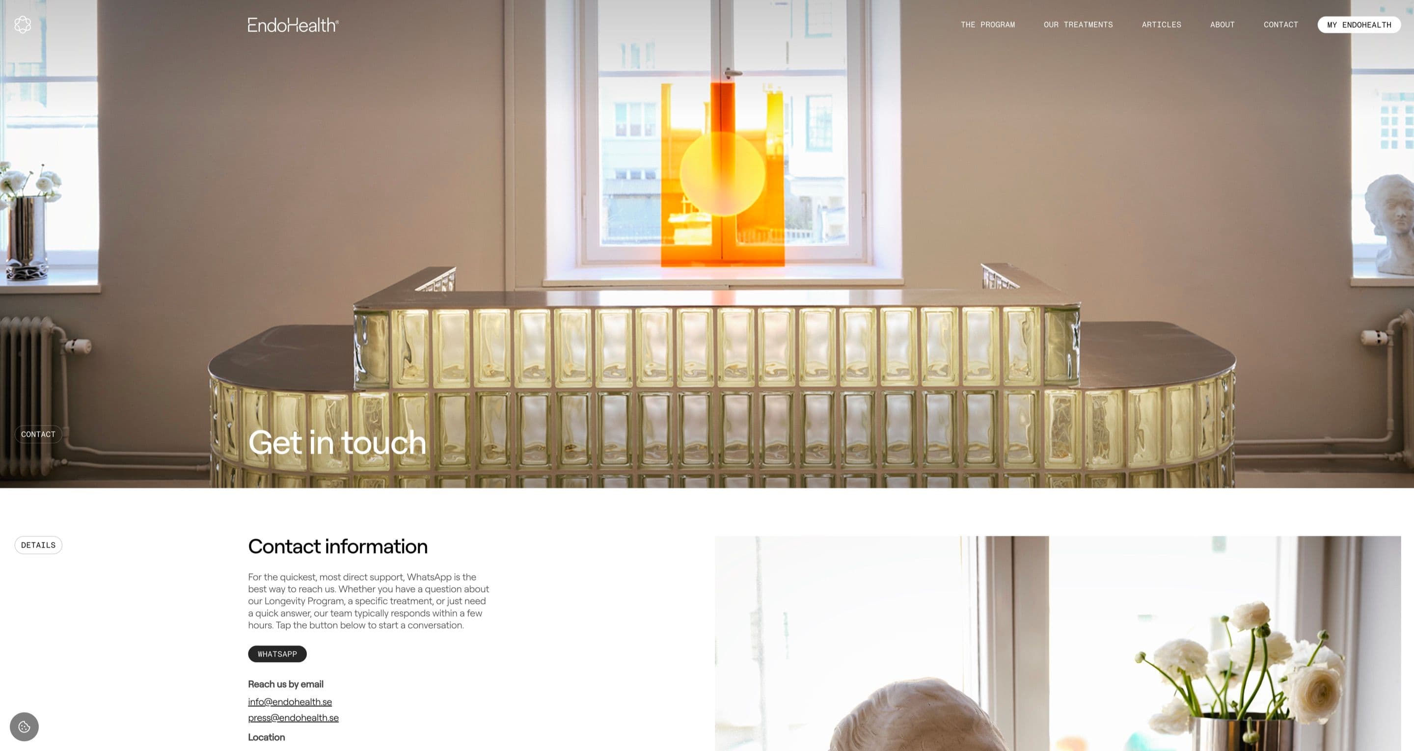 The contact page on endohealth.se, with a glass-block reception desk hero above contact details and a WhatsApp button