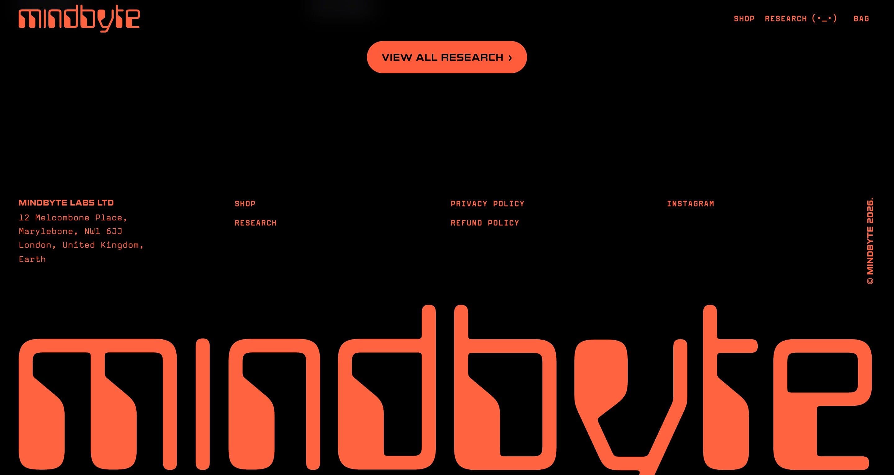 The footer on mindbyte.com, a giant orange mindbyte wordmark on black